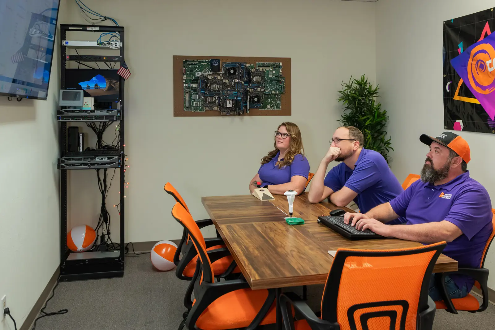 Radiant Technology Solutions team meeting in the Tarpon Springs conference room