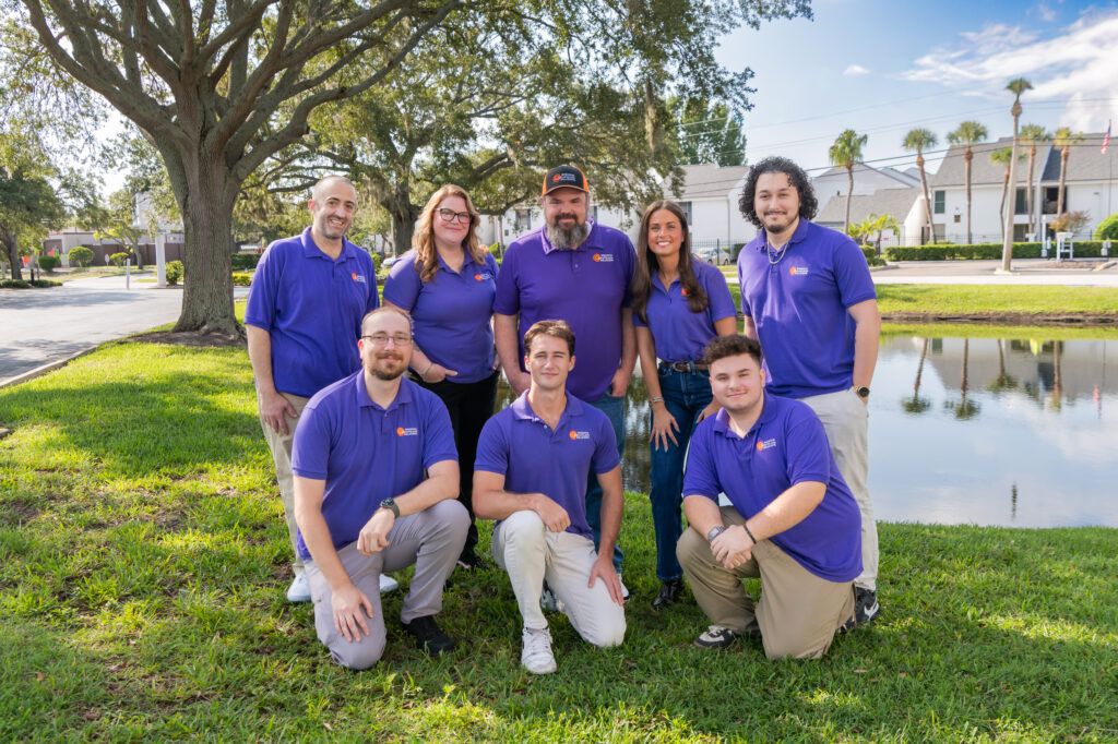 Radiant Technology Solutions Team | Managed IT Services in Tarpon Springs, FL Radiant Technology Solutions IT support team standing outdoors in Tarpon Springs Florida providing managed IT services cybersecurity and technology support for businesses.